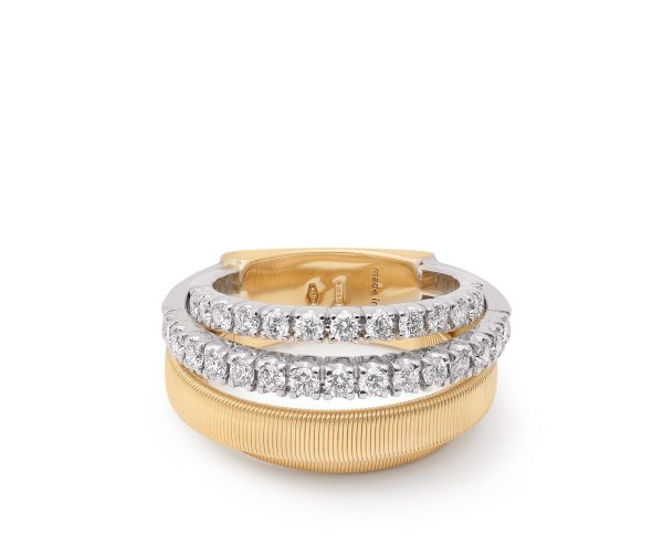 The Marco Bicego Yellow Gold 4-Strand Coil Ring with Pavé Diamond displays elegant craftsmanship, featuring a dual-band design with a gold base and a diamond-encrusted silver band above it, set against a plain white background.