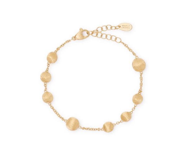 Introducing the Marco Bicego Africa Bead Bracelet (Copy), a delicate piece crafted with smooth round gold beads that are evenly distributed along a fine chain. It includes an adjustable clasp and a small tag for easy size adjustments. This bracelet boasts a simple yet elegant design, making it perfect for everyday wear or special occasions.