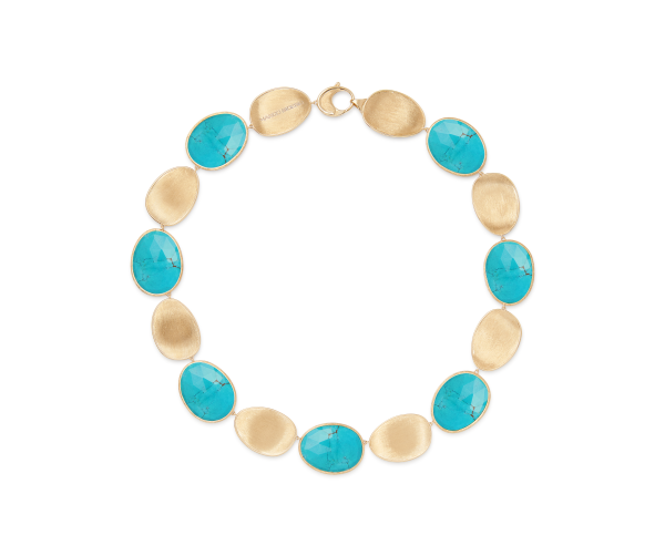 The Marco Bicego Lunaria Turquoise Collar Necklace showcases a circular arrangement of alternating oval-shaped turquoise and gold stones. The turquoise stones have a marbled appearance, while the gold stones are smooth and matte, and the necklace is fastened with a clasp at the top.