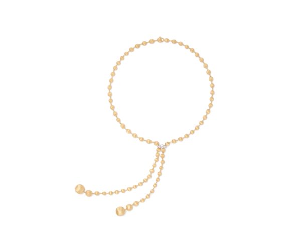 The Marco Bicego Africa Yellow Gold Lariat Necklace With Diamond Pavé Clasp showcases a symmetrical, circular design accentuated by beige beads. Two strands gracefully extend downward, each adorned with a larger bead at the end. The necklace is elegantly presented against a plain white background.