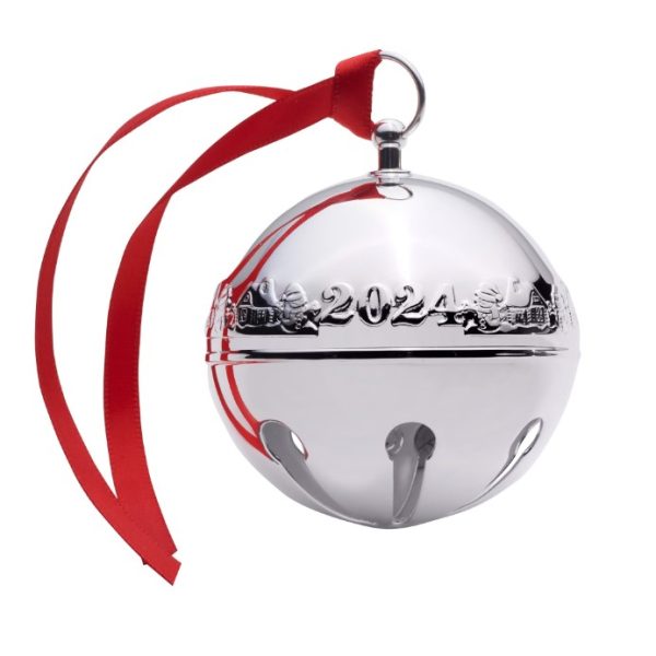 The 2024 Wallace Sleigh Bell - 54th Edition is a silver ornament featuring festive engravings and "2024," complete with a bright red ribbon for hanging.