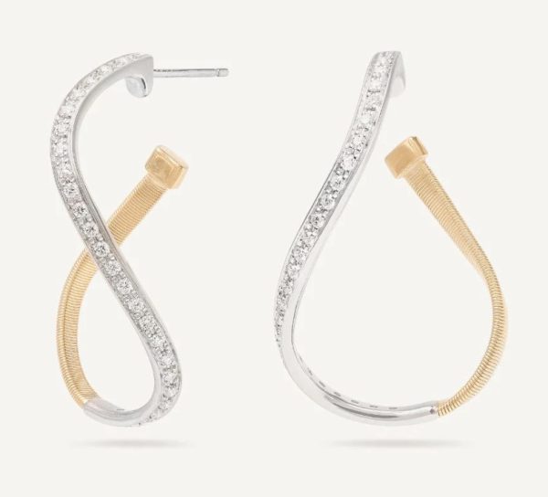 Introducing the Marco Bicego Marrakech Diamond Twisted Hoop Earrings: These elegant earrings feature a gracefully curved asymmetrical "S" shape, with silver segments adorned with small, sparkling diamonds and gold segments showcasing a textured, coiled design.